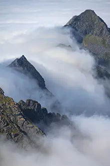 Mountain landscape in clouds, view from the top of Stornappstinden