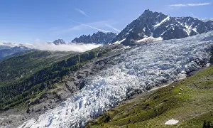 Mountain landscape with glacier Glacier des Bossons and summit of the Aiguille du Midi