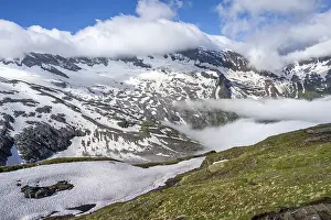 Mountain landscape with high fog in the valley