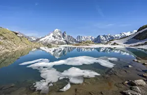Mountain landscape with mountain lake and ice floe