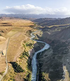 Mountain landscape with river in a narrow mountain valley in autumn