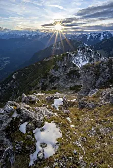 Mountain panorama, mountain landscape with sun star at sunset