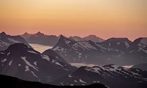 Mountain panorama, mountain peaks in soft light at sunset
