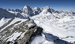 Mountain panorama with snow-covered mountain landscape in winter