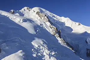 Mountain peak with glacier at sunrise