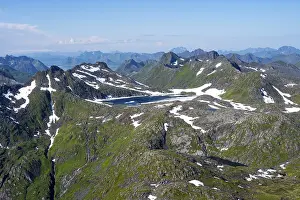 Mountain peak and lake, view at the summit of Rundfjellet