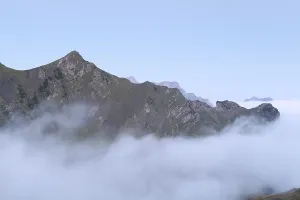 Mountain peak in morning fog, Bavaria, Germany