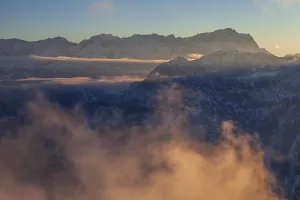 Mountain peak in winter, evening light