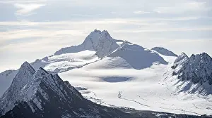 Mountain peaks and glaciers in the morning light