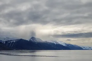 Mountain range in the fog, sea