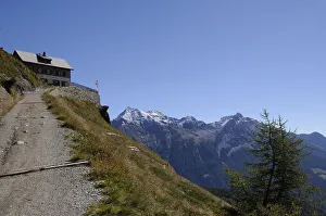 Mountain restaurant above alp Gruem with view to Posciavo
