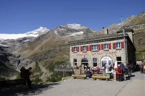 Mountain restaurant and Bernina Express Station Alp Gruem