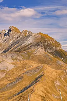 Mountain ridge with paths in warm autumn tones