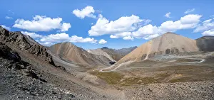 Mountain road through a colourful mountain landscape