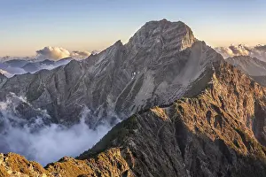Mountain scenery with clouds and mist in the morning