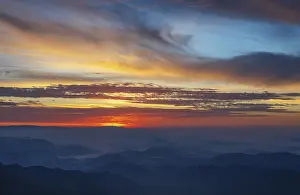 Mountain silhouette, sunrise on the Gerlitzen with view into the Klagenfurt basin