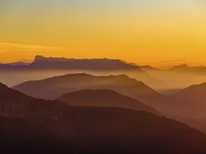 Mountain silhouettes at dusk, Alpine panorama from Schafberg with the Untersberg