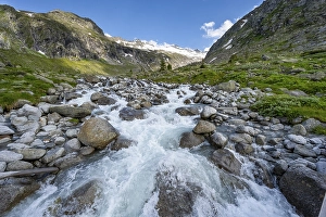 Category Mountain Landscapes Prints: Mountain stream Hornkeesbach, behind mountain peak with snow and glacier Hornkees