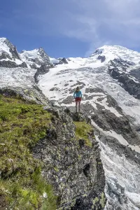 Mountaineer in front of a glacier