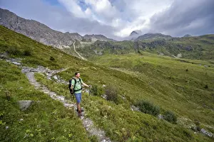Mountaineer on a hiking trail in the upper Leitner valley