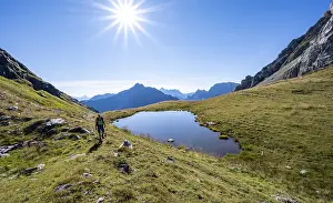 Mountaineer at a mountain lake