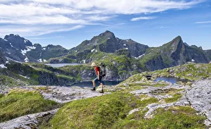 Mountaineer, mountain landscape with rocky pointed peaks and lakes