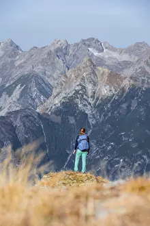 Mountaineer in the mountains in autumn