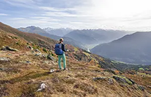Mountaineer in the mountains in autumn