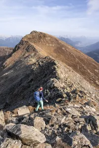 Mountaineer in the mountains in autumn