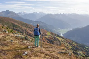 Mountaineer in the mountains in autumn