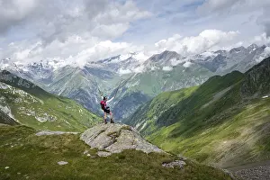 Mountaineer on a rock at the Mittagskoegele