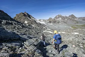 Mountaineer in rocky mountain landscape