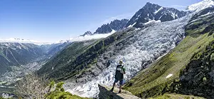 Mountaineer standing on a rock
