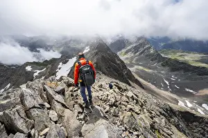 Mountaineer on the summit of Lasoerling