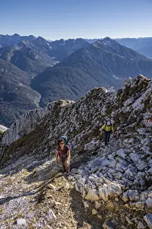 Mountaineers climbing, hiking trail to Arnspitze