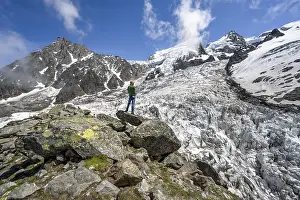 Mountaineers on the glacier, High alpine glaciated mountain landscape