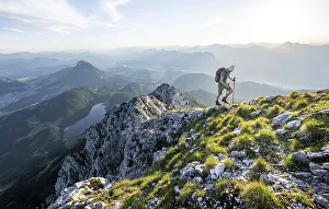 Mountaineers at the summit of the Scheffauer in the atmospheric evening light
