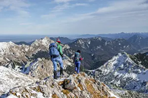 Mountaineers in winter, hiking to the Ammergauer Hochplatte in the Ammergau Alps