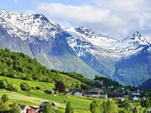 Mountains and Fiord over Norwegian Village