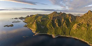 Mountains by the fjord in the evening