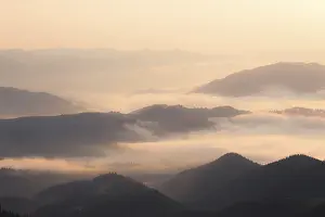Mountains hills at foggy morning