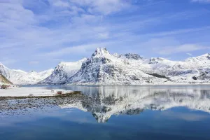 Mountains at Kilan are reflected in Fjord