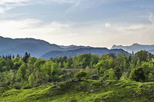 Mountains in Lake District National Park over Coniston Water