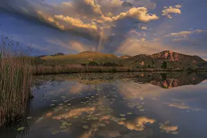 Category Mountain Landscapes Prints: Mountains reflected in lake, cloudy mood