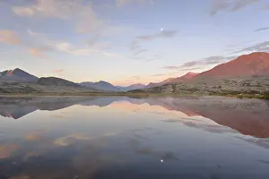 Mountains reflected in Lake Doralstjornin or Doralstjornin