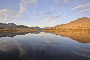 Mountains reflected in Lake Doralstjornin or Doralstjornin