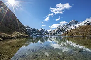 Mountains reflected in lake, Lake Harris