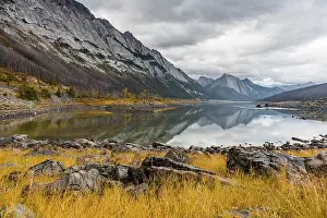 Mountains reflected in a lake, Medicine Lake