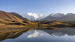 Mountains reflected in a small mountain lake