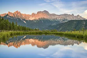 Mountains reflected in a small mountain lake